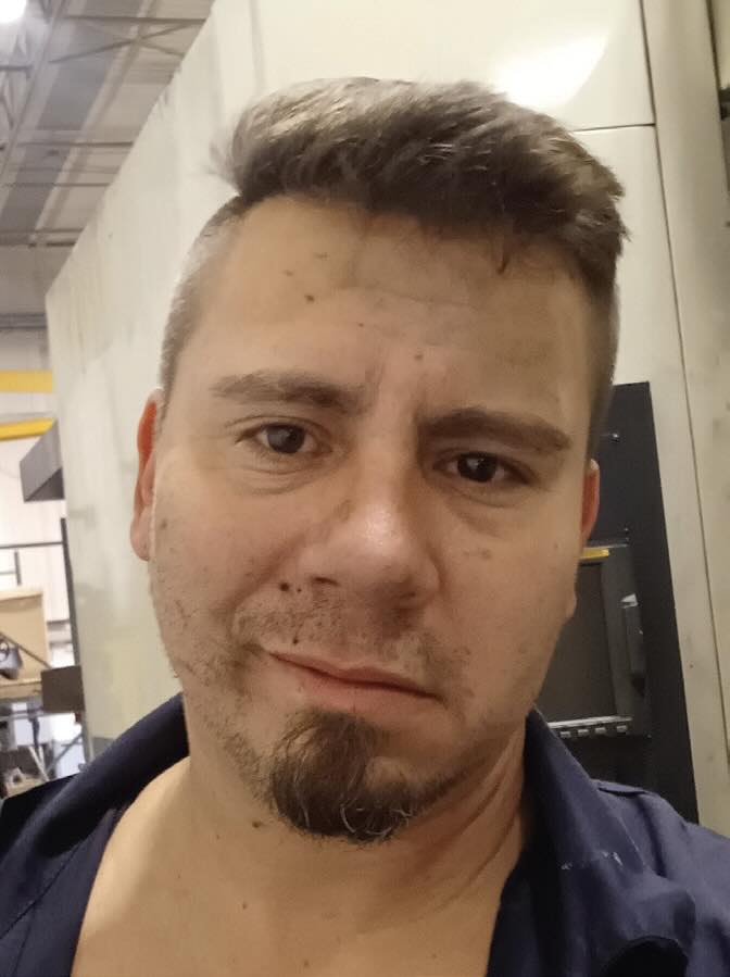 A photo of a smiling man