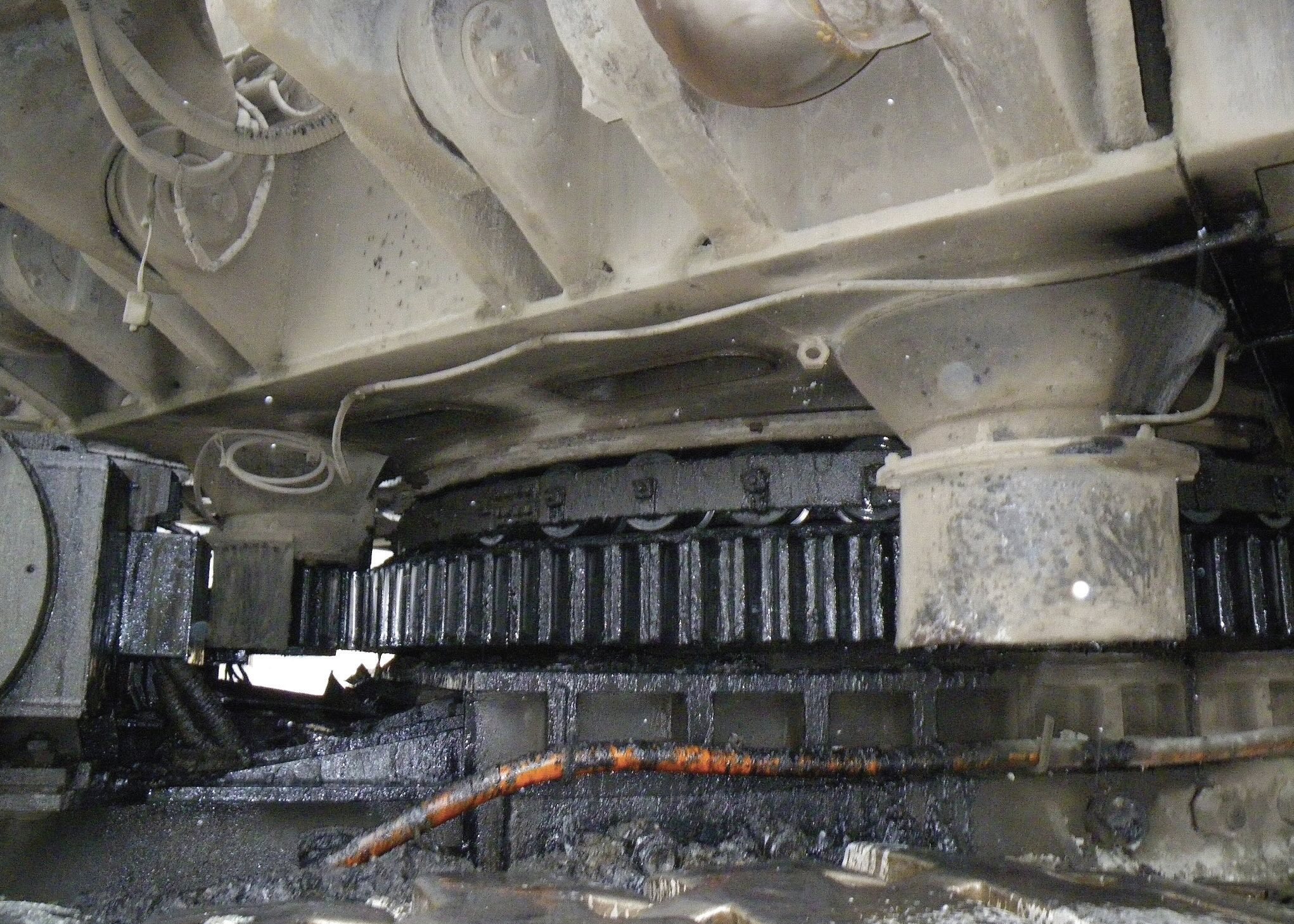 Grease on an open gear of a rotary cement kiln